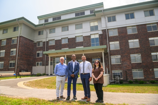 President Robert Rodriguez and President Darrell Wheeler in front of Awosting Hall